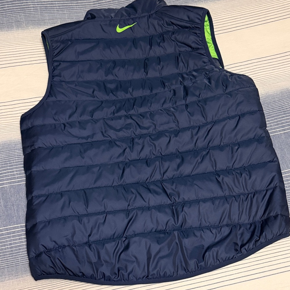 Women’s Nike Seahawks Navy and Green Reversible Puffer Vest - Picture 4 of 7